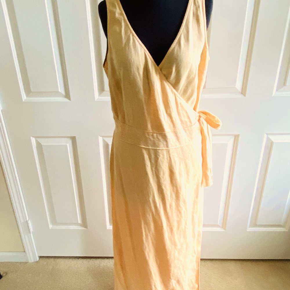 Light peach long linen wrap dress with a side tie. Made by Bloomingdale’s